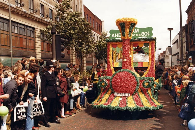 Lewis's decorated float as it 'steams' up The Headrow past Lewis's department store, seen left. 300,000 people turned out on the blustery, showery June day to watch the 7th Lord Mayor's Annual Parade wind it's way around the city centre.