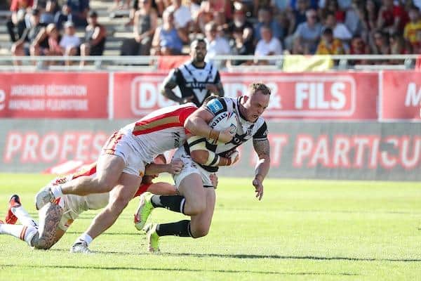 Jordan Johnstone on the attack for Hull FC at Catalans Dragns in June, 2022. Picture by Manuel Blondeau/SWpix.com.