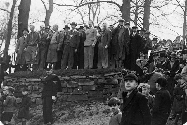 Crowds at the opening ceremony of Gotts Park Golf Course in April 1933. It was opened by the Lord Mayor, Alderman Robert Holliday Blackburn JP, who is seen in the centre of the group gathered at the top. A policeman is keeping order below.