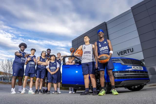 The team shows off their new kit