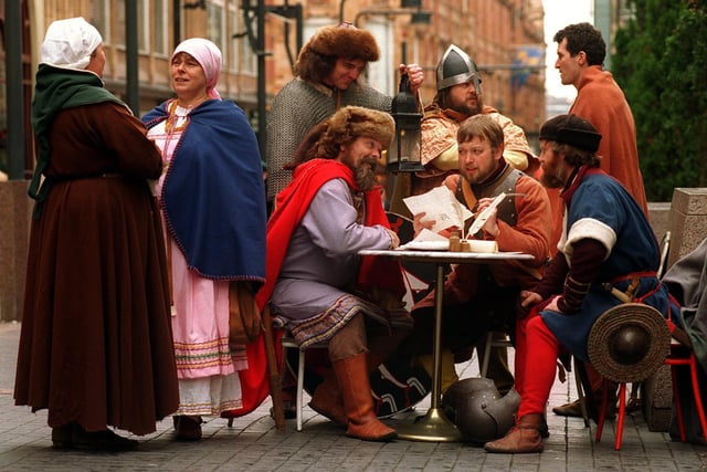 A group of actors in period costume from the Royal Armouries decide on a battle plan for the display's they will be staging in the city centre when the museum opened in March 1996.