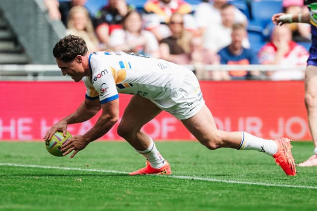 Leeds Rhinos' Brodie Croft, seen scoring at Magic Weekend against Bradford Bulls, is now on 20 tries for the season following a hat-trick against Catalans Dragons. Picture by Alex Whitehead/SWpix.com.