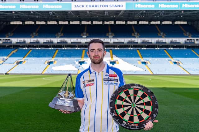 World darts champion Luke Humphries visited Elland Road with the Premier League trophy ahead of Thursday night's event at FD Arena. Picture by Dan Richardson/Leeds United/PDC
