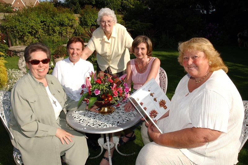 A flower show in South Shields in 2004. The people having fun in the sun were Rev Ann Jackson with Sue Stonehouse, Margaret Hogg, Linda Wraith and Kate Bell.