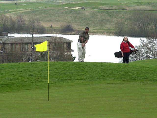 Jaz Singh Athwal, the new captain at Waterton Park Golf Club in Walton is seen here on the 18th hole with ladies captain Marilyn Smith in March 2000.