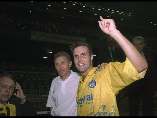 1992: Howard Wilkinson (left) Manager of Leeds and Carl Shutt (right) of Leeds celebrate after winning the European Cup first round replay match against Stuttgart in Barcelona, Spain. Leeds won the match 2-1. \ Mandatory Credit: Allsport UK /Allsport