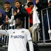 PERTH, AUSTRALIA - JULY 22: Darko Gyabi of Leeds United takes a selfie with the supporters during the Pre-Season friendly match between Leeds United and Crystal Palace at Optus Stadium on July 22, 2022 in Perth, Australia. (Photo by James Worsfold/Getty Images)