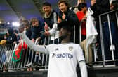 PERTH, AUSTRALIA - JULY 22: Darko Gyabi of Leeds United takes a selfie with the supporters during the Pre-Season friendly match between Leeds United and Crystal Palace at Optus Stadium on July 22, 2022 in Perth, Australia. (Photo by James Worsfold/Getty Images)