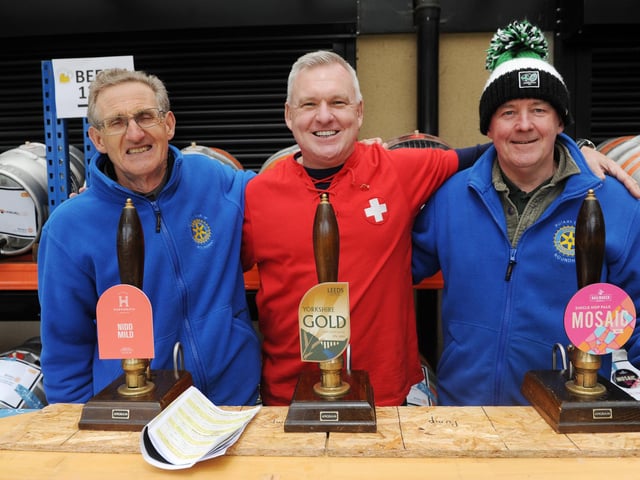 Local rotary club members Steve McGrail and Tim Capstick were joined for a shift behind the bar by Chris Eaborn, centre. A member of the Rotary Club Lausanne in Switzerland, his son went to Leeds Grammar School.