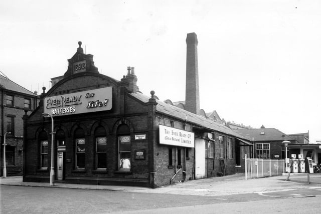 industrial premises on Springwell Road pictured in March 1965. Built in 1898, this property was originally used by T. Batt and Co, oil and tallow merchants and grease manufactures. At the time of this view it was a warehouse and office for the Ever Ready Battery Co. On the right, BP petrol pumps can be seen at the Whitehall Service Station.