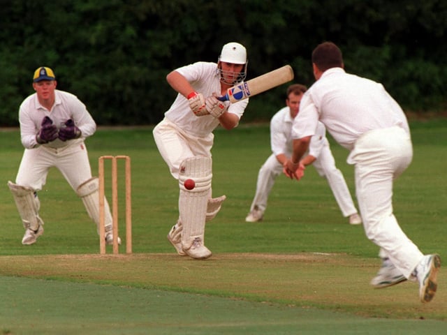 Great Preston batsman Ian Newton plays a shot from Andy Proctor watched by Whitkirk's Aussie keeper Warren McLaren in  August 1997.