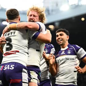 Lachlan Walmsley, centre of picture, celebrates with Cam Scott, left, after the latter's try for Wakefield Trinity in the Grand Final win against Warrington Wolves. Picture by Olly Hassell/SWpix.com.
