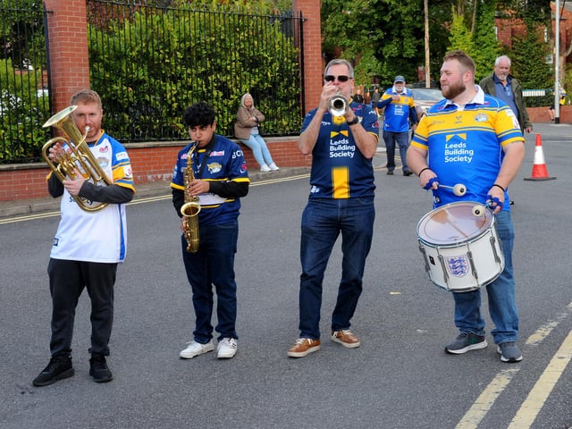 The famous Leeds Rhinos South Stand band arrive at Headingley for the match against Wigan Warriors.