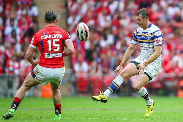 Danny McGuire in action for Rhinos at Wembley in 2015. The Hull KR player is James Donaldson, who is now at Leeds. Picture by Alex Whitehead/SWpix.com.