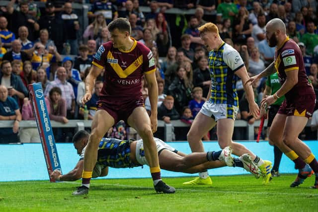 David Fusitu'a dives in to score his second try against Huddersfield. Picture by Bruce Rollinson.