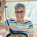Karen Wright cooking in her happy place