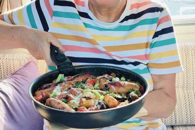 Karen Wright cooking in her happy place