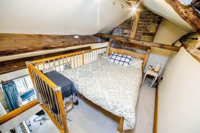 There's a mezzanine level to one bedroom which has sufficient room for a double bed.
