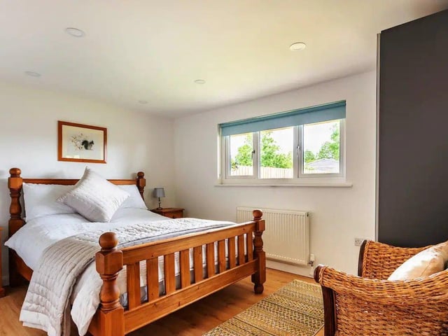 The bed is king sized and bedding, towels, a hairdryer, shampoo, conditioner and body wash are all provided.