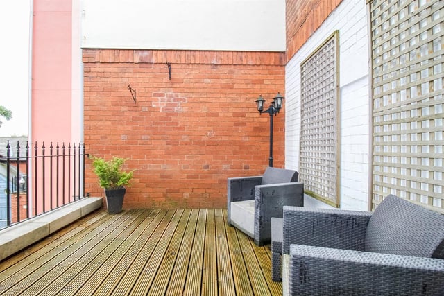 This upper terrace is accessible from one of the three bedrooms on the first floor.