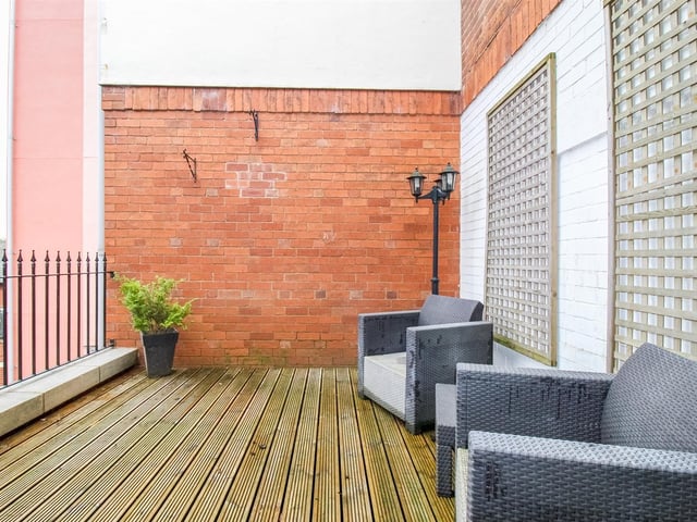 This upper terrace is accessible from one of the three bedrooms on the first floor.