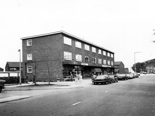 Upper Town Street looking south-east in May 1979, showing a parade of shops including B. Field, a chemist, Severn Sports, Hopecroft Turf Accountant and F.Moss fish and chips.