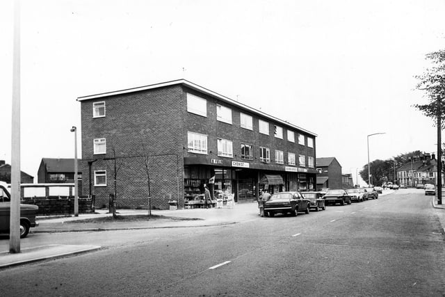 Upper Town Street looking south-east in May 1979, showing a parade of shops including B. Field, a chemist, Severn Sports, Hopecroft Turf Accountant and F.Moss fish and chips.