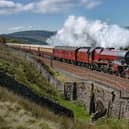 Letting off steam ... the Northern Belle thunders over the Settle-Carlisle line
