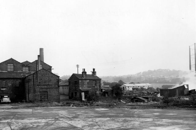 Part of Wortley Low Mills off Whitehall Road. Houses and part of an empty gasholder to the right. Pictured in September 1946.