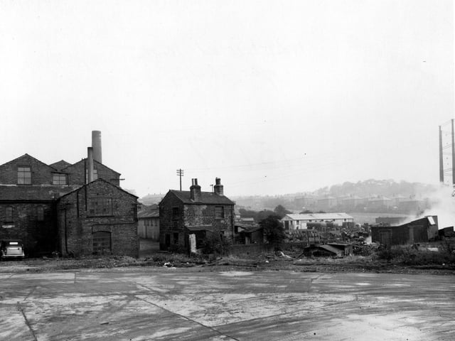 Part of Wortley Low Mills off Whitehall Road. Houses and part of an empty gasholder to the right. Pictured in September 1946.
