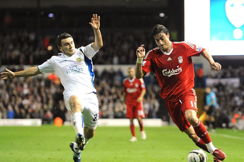 Albert Riera of Liverpool attempts to dribble past Robert Snodgrass of Leeds United during the Carling Cup 3rd Round match between Leeds United and Liverpool at Elland Road. (Photo by John Powell/Liverpool FC via Getty Images)