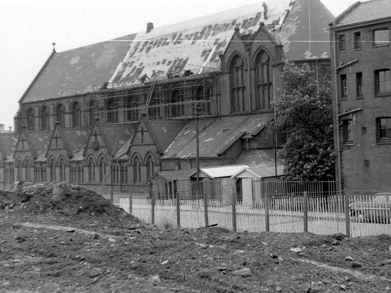 St. Patrick's Roman Catholic Church located in Rider Street at the junction with New York Road. Re-tiling is being carried out on the roof. In the foreground land clearance is taking place alongside Rider Street.