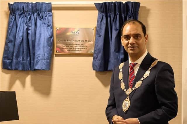 Deputy Lord Mayor Cllr Mohammed Shafiq with the official Greenholme House Care Home plaque.