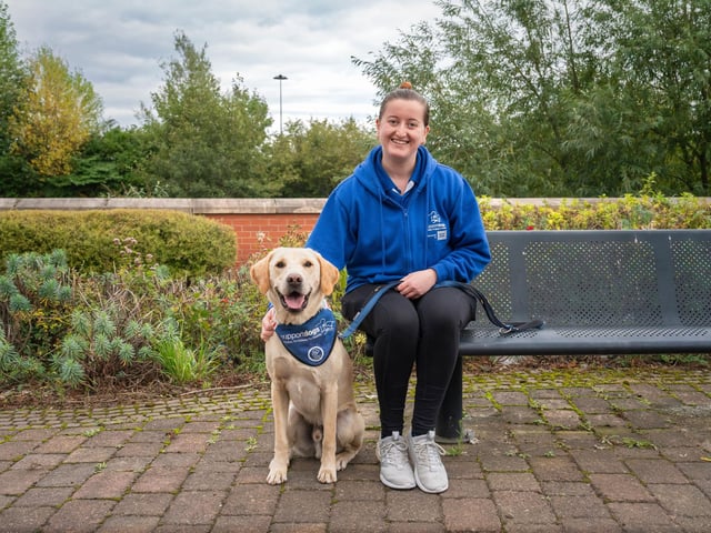 Annabel Love, a client services co-ordinator with Support Dogs, pictured here with Newton, is also taking part in the Skydive Day