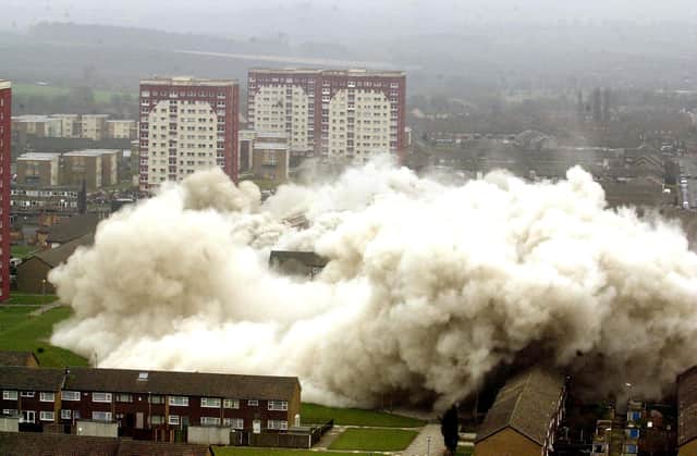 Controlled demolition of two blocks of flats in the Swarcliffe area of Leeds on Saturday, March 24, 2001.