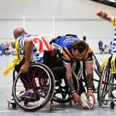 Josh Butler scores for Leeds Rhinos in their Betfred Wheelchair Challenge Cup final defeat by Halifax Panthers at Robin Park Arena in Wigan. Picture by Olly Hassell/SWpix.com.