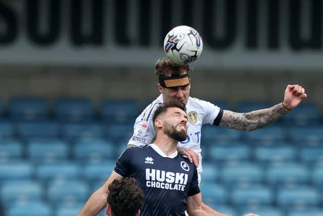 Leeds United's Joe Rodon (top) in action against Millwall's Tom Bradshaw during the Sky Bet League Championship match at The Den, London. Picture date: Sunday September 17, 2023. PA Photo. See PA story SOCCER Millwall. (Photo: George Tewkesbury/PA Wire)