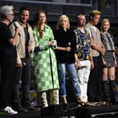 (From L) Director James Gunn, actor Chris Pratt  Karen Gillan, Pom Klementieff, Sean Gunn, Will Poulter and Maria Bakalova present Guardians of the Galaxy Vol. 3 at the Marvel panel in Hall H of the convention centre during Comic-Con International in San Diego, California, July 23, 2022.