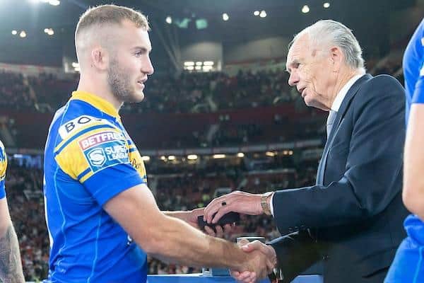 Jarrod O'Connor - seen receiving his 2022 Grand Final runner-up medal from Super League chairman Ken Davy - reckons Rhinos can go one better this year. Picture by Allan McKenzie/SWpix.com.