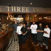 Kirkstall Brewery co-founders Steve Holt and John Kelly with the chefs at Dastaan, who are collaborating on the new Leeds pub The Three Swords (Photo by Jonathan Gawthorpe/National World)