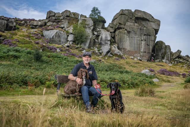 Former serviceman John Sibary who set up On Tha Moor making a range of natural dog soaps in Ilkley pictured with his two dogs Laika and Hazel Photograph by Tony Johnson.
