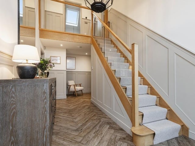 Upon entering the property, there is a striking vaulted entrance hallway.