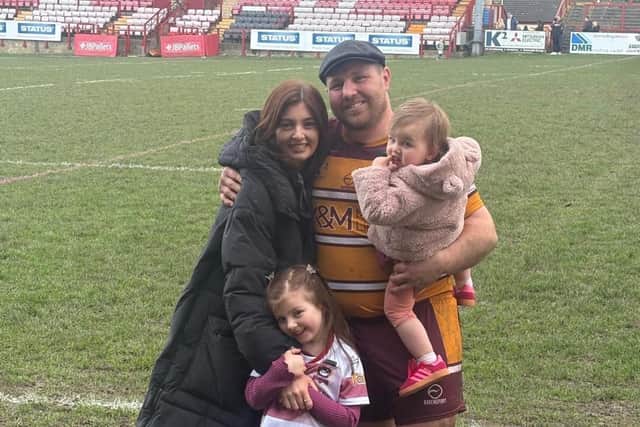 The Cooper family at the Fox's Biscuits Stadium, the home of Batley Bulldogs.