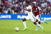 IMPRESSING: Leeds United's new winger summer signing Luis Sinisterra, left, pictured during last month's pre-season friendly against Aston Villa in Brisbane.
Photo by Chris Hyde/Getty Images.