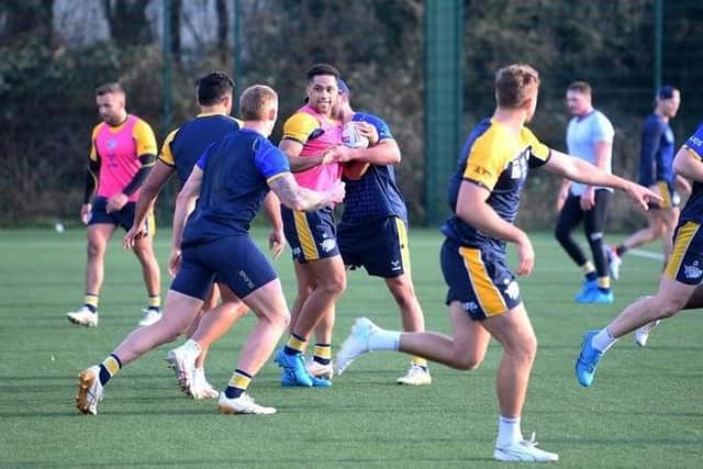 Darrell Olpherts (with ball) says he's confident he and Leeds Rhinos can have a big year. Picture by Simon Hulme.