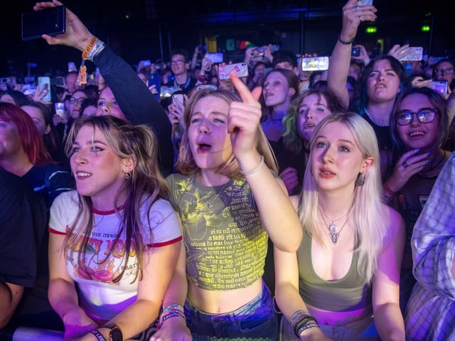 Fans enjoying Lovejoy on stage at Beckett University.
