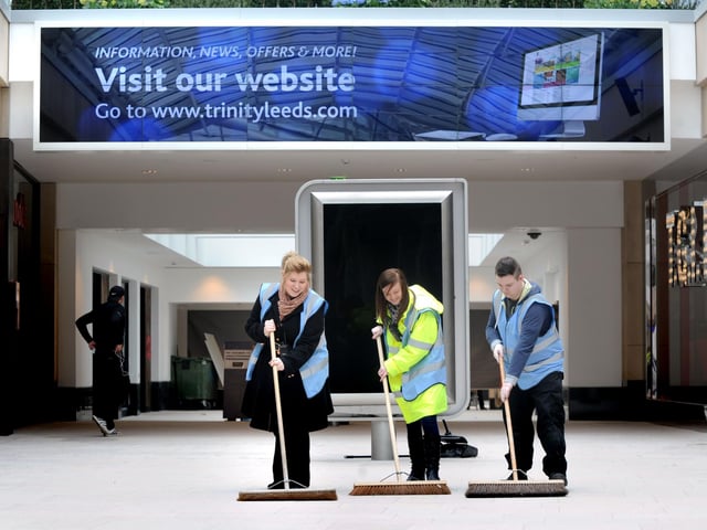 Last minute cleaning up at Trinity Leeds on opening day. Pictured, from left, are Lucy McNamara, Natasha Town and Sam Mayes.