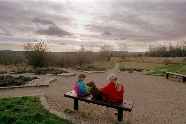 Two local children enjoy the award winning Kippax Park in February 1999. The 19 acre site has been transformed using local unemployed people.