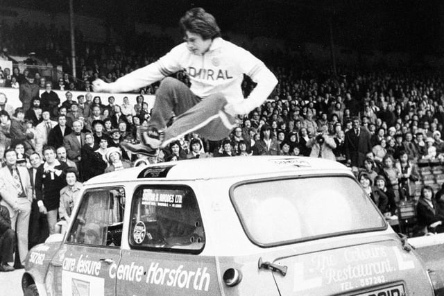 Leeds United star Duncan McKenzie showcased his 'party piece' of leaping over a mini car at Elland Road before Paul Reaney's testimonial game in May 1976.