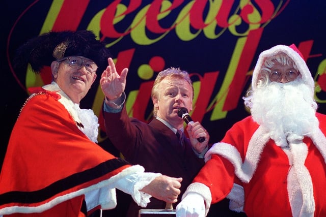 TV personality Les Dennis counts down the switch-on for the Leeds Christmas lights in the city centre, with help from the Lord Mayor of Leeds, Coun Graham Kirkland, left, and Father Christmas.